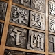 Vintage metal letterpress printing blocks with Chinese characters in a movable-type cabinet
